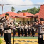 Kombes Pol.H.Ompusunggu, S.I.K., M.Si., saat Pimpin Upacara Bendera HKN, di Lapangan Apel Mapolresta Tanjungpinang, Jum'at (17/03/2023)./f.dok.Hms.